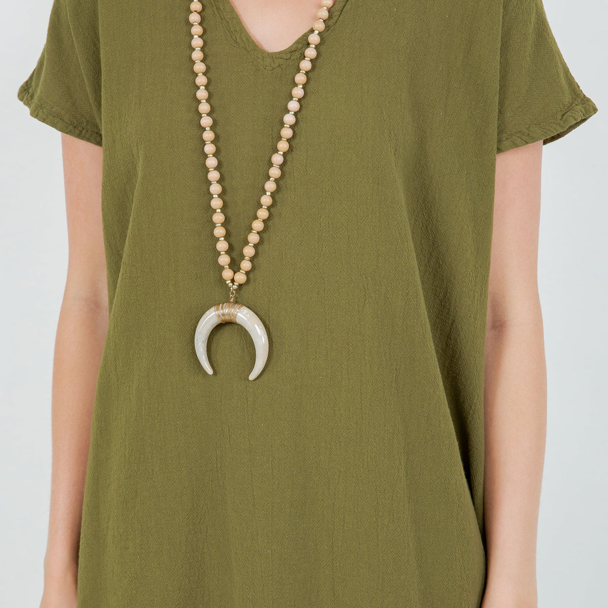 Betsy cotton gauze top neckline, olive green V-neck, short sleeves, loose drape