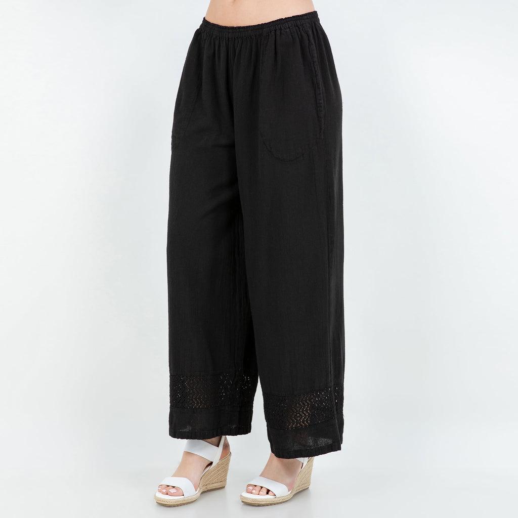 Black cotton gauze wide-leg pants with elastic waist and lace trim at hem