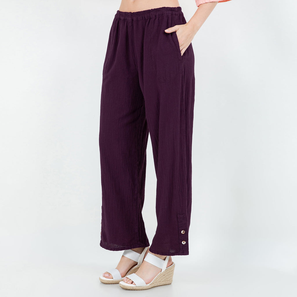 Eggplant purple cotton gauze pull-on pants with side pockets and buttoned cuffs