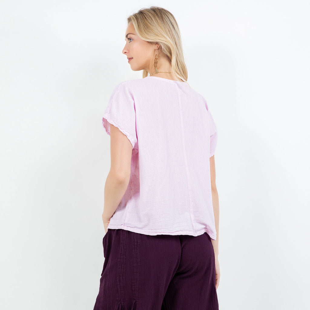 Lavender cotton gauze top back view with short sleeves and loose V-neckline
