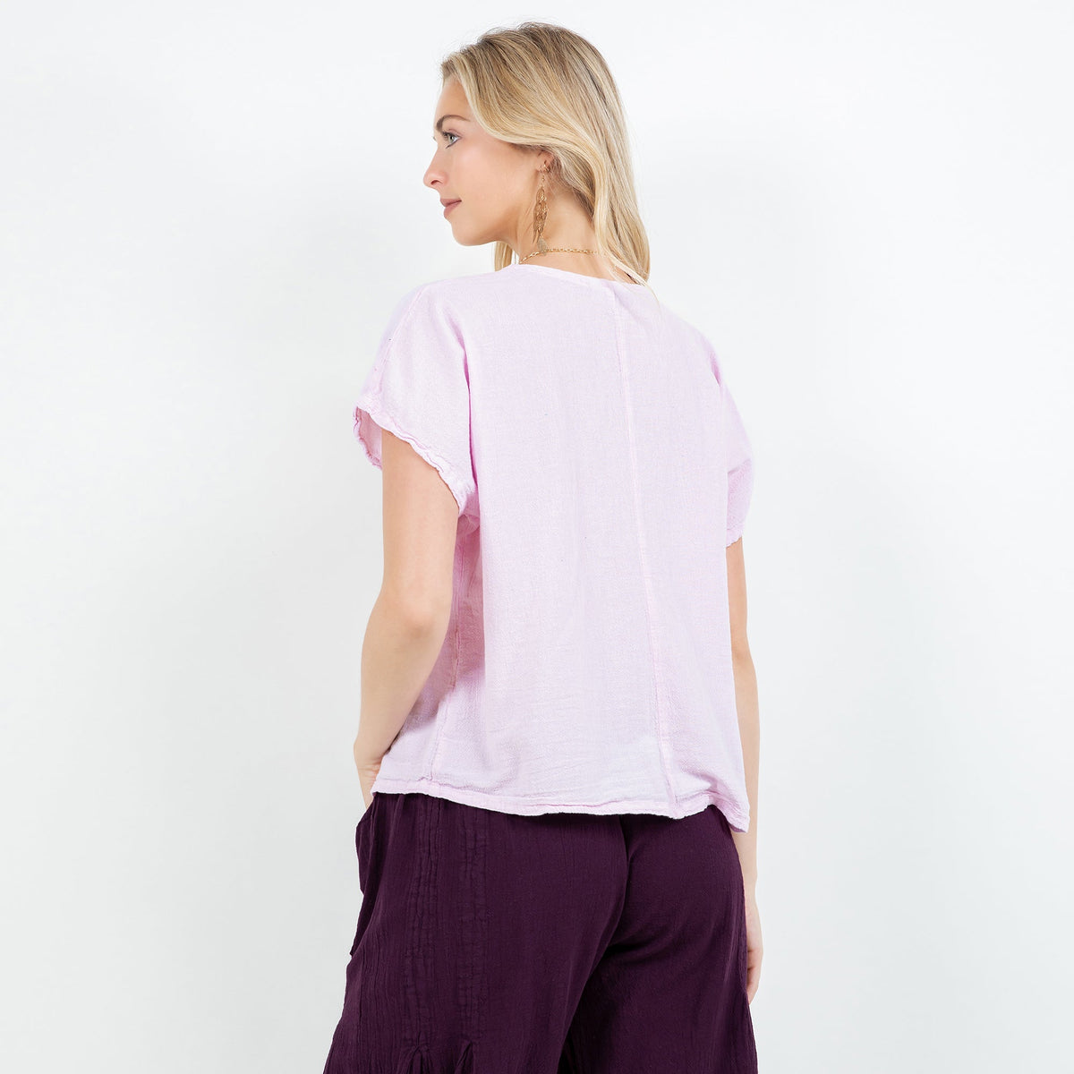 Lavender cotton gauze top back view with short sleeves and loose V-neckline