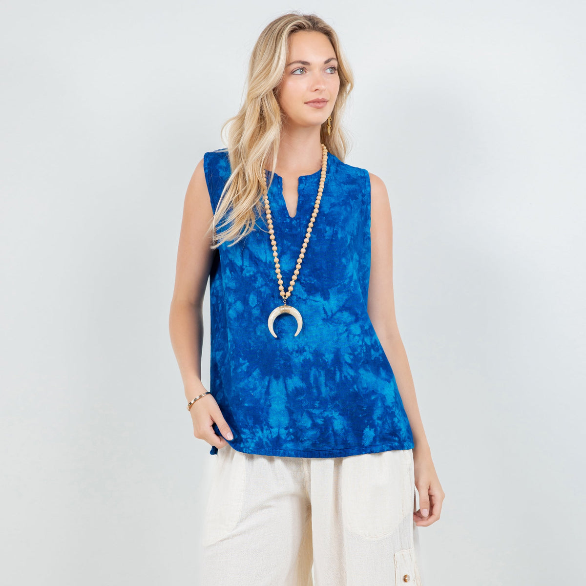 Blue tie-dye cotton gauze sleeveless top, V-neck with center opening