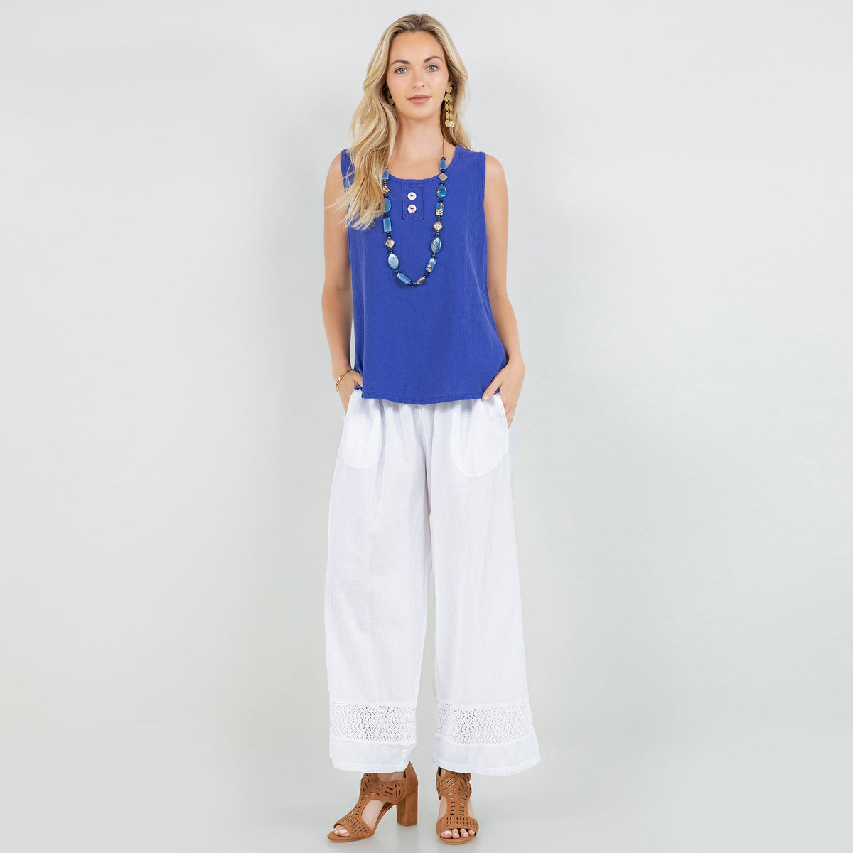 Women's cotton gauze sleeveless top in deep blue, round neck with button front