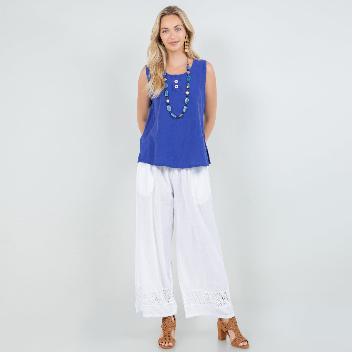 Women's cotton gauze Anne top, blue sleeveless with scoop neck and short length.