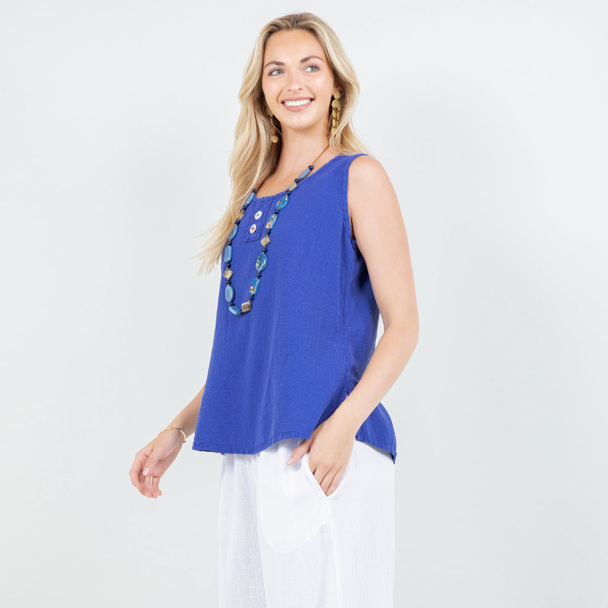 Women's cotton gauze Anne top, blue sleeveless with button front and scoop neck.