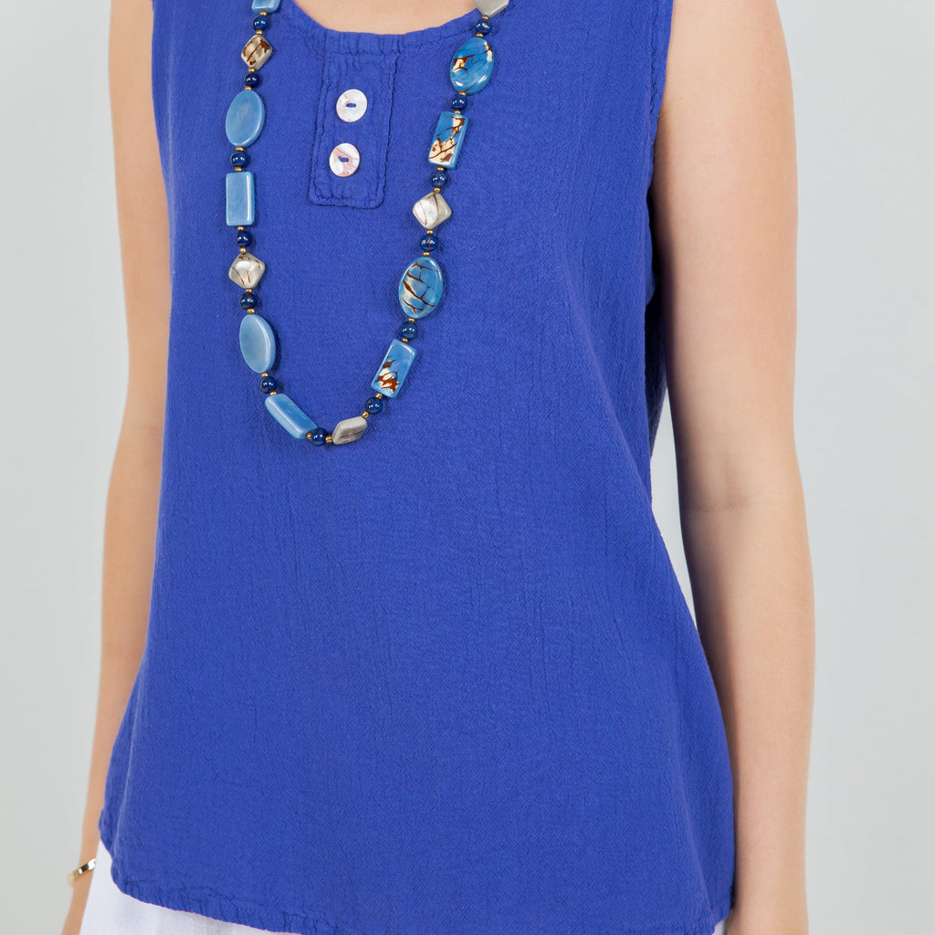 Women's cotton gauze Anne top, blue close-up with three-button placket detail.