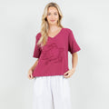 Women's cotton gauze turtle top with short sleeves, V-neck, magenta with embroidered turtle