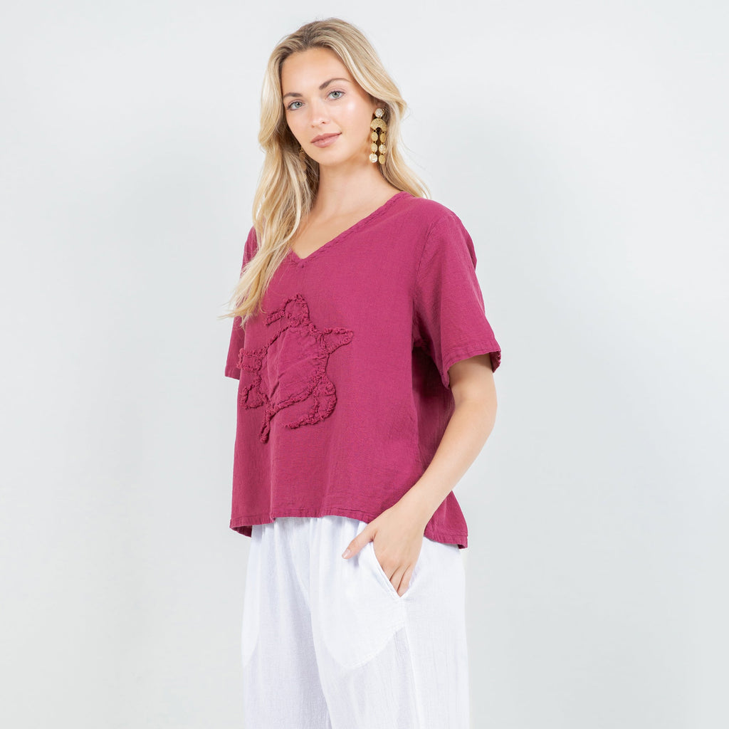 Women's cotton gauze turtle top with short sleeves, V-neck, magenta with embroidered turtle
