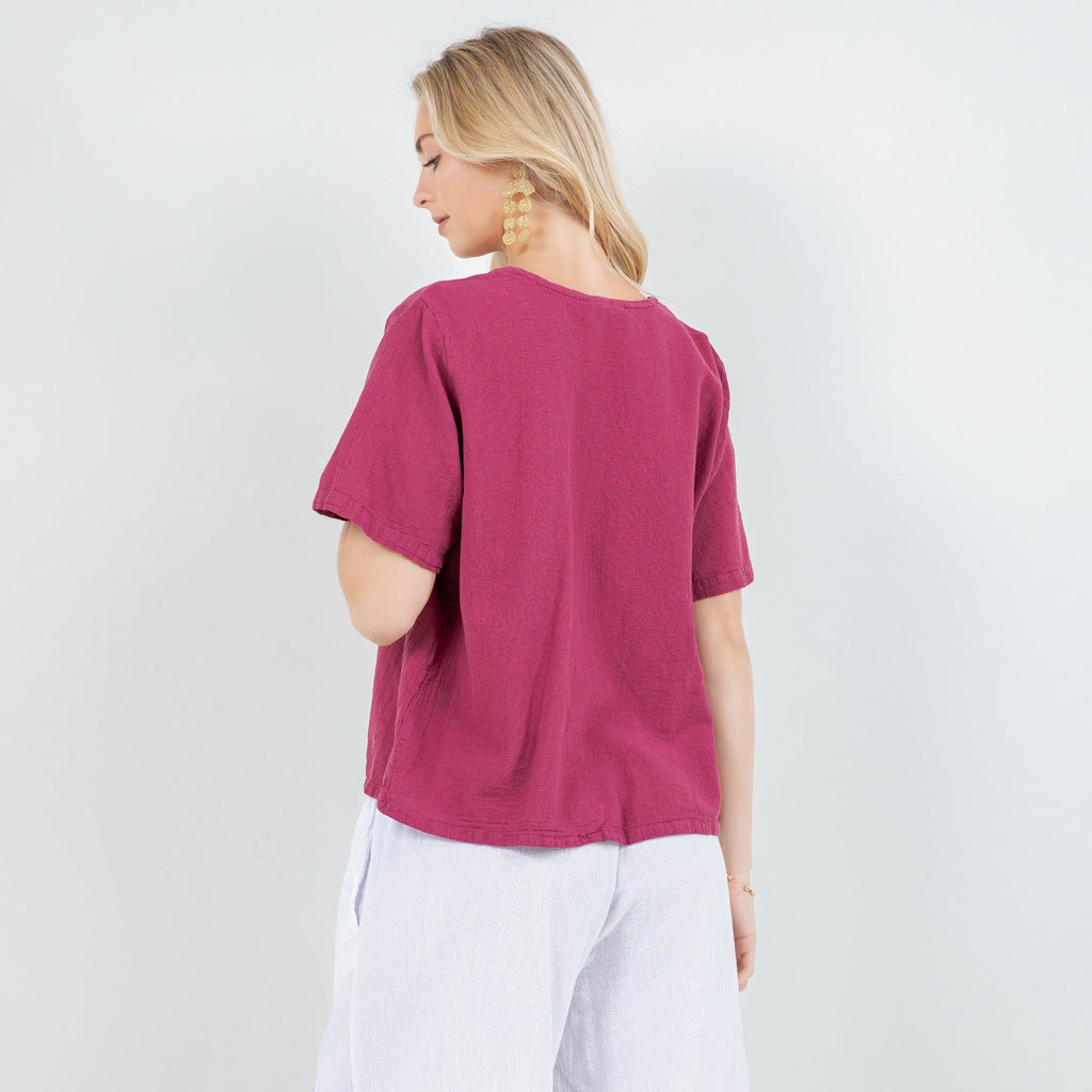Women's cotton gauze turtle top with short sleeves, back view, magenta