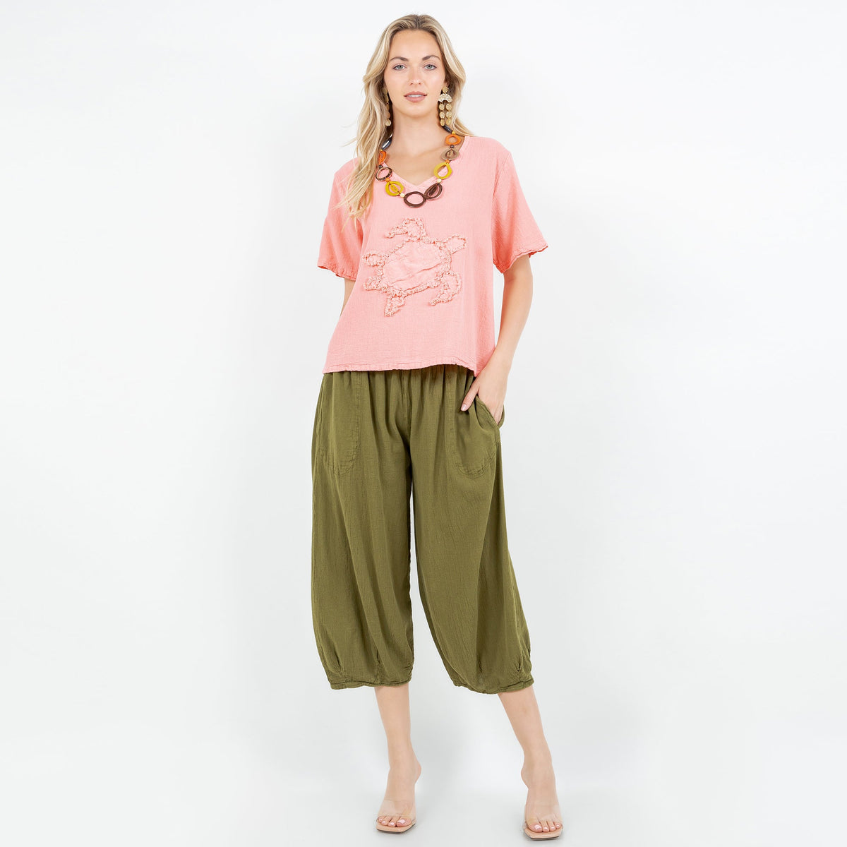 Women’s pink cotton gauze top with embroidered applique, V-neck, short sleeves
