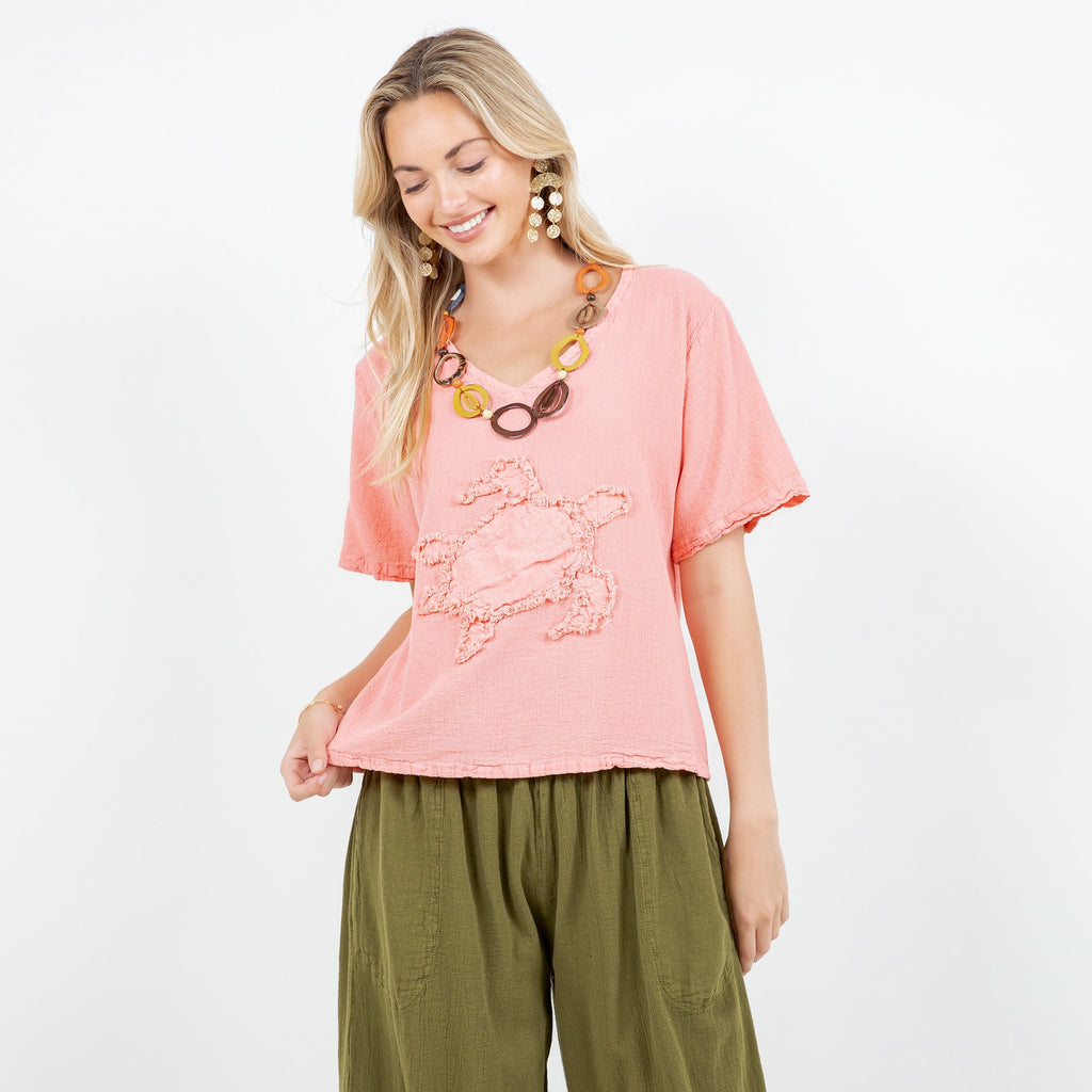 Women’s pink cotton gauze V-neck top with embroidered applique, short sleeves