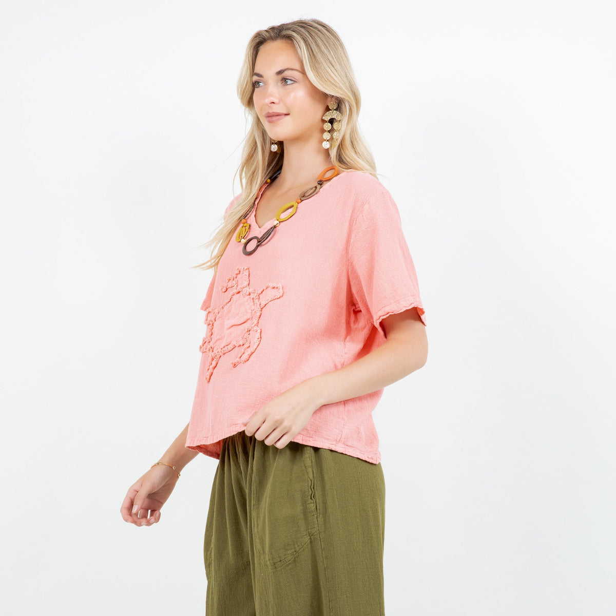 Women’s pink cotton gauze top with embroidered applique, V-neck, short sleeves