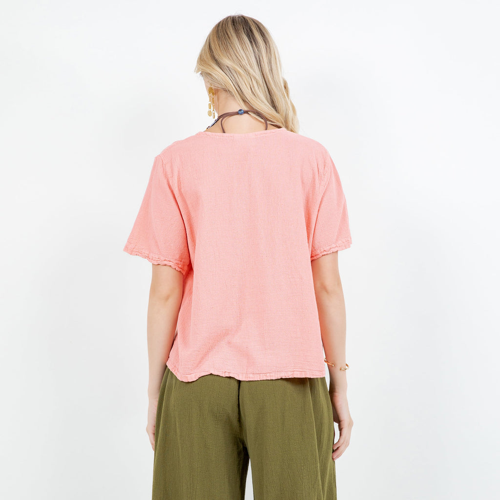 Women’s pink cotton gauze top, back view, short sleeves and relaxed hem