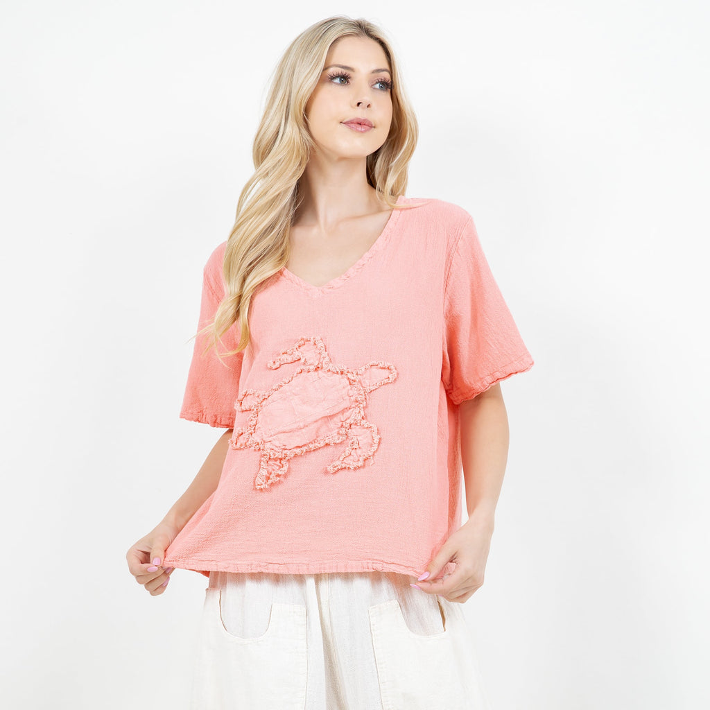 Women’s pink cotton gauze top with embroidered applique, V-neck, short sleeves