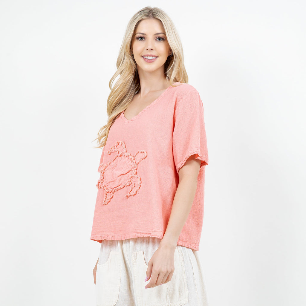 Women’s pink cotton gauze top with embroidered applique, V-neck short sleeves