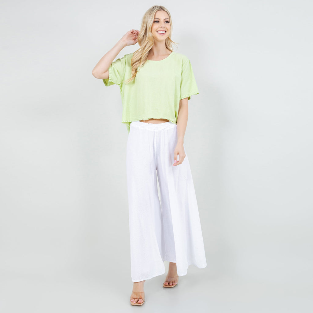 White cotton gauze Blanche pants with elastic waist and flowing wide-leg silhouette