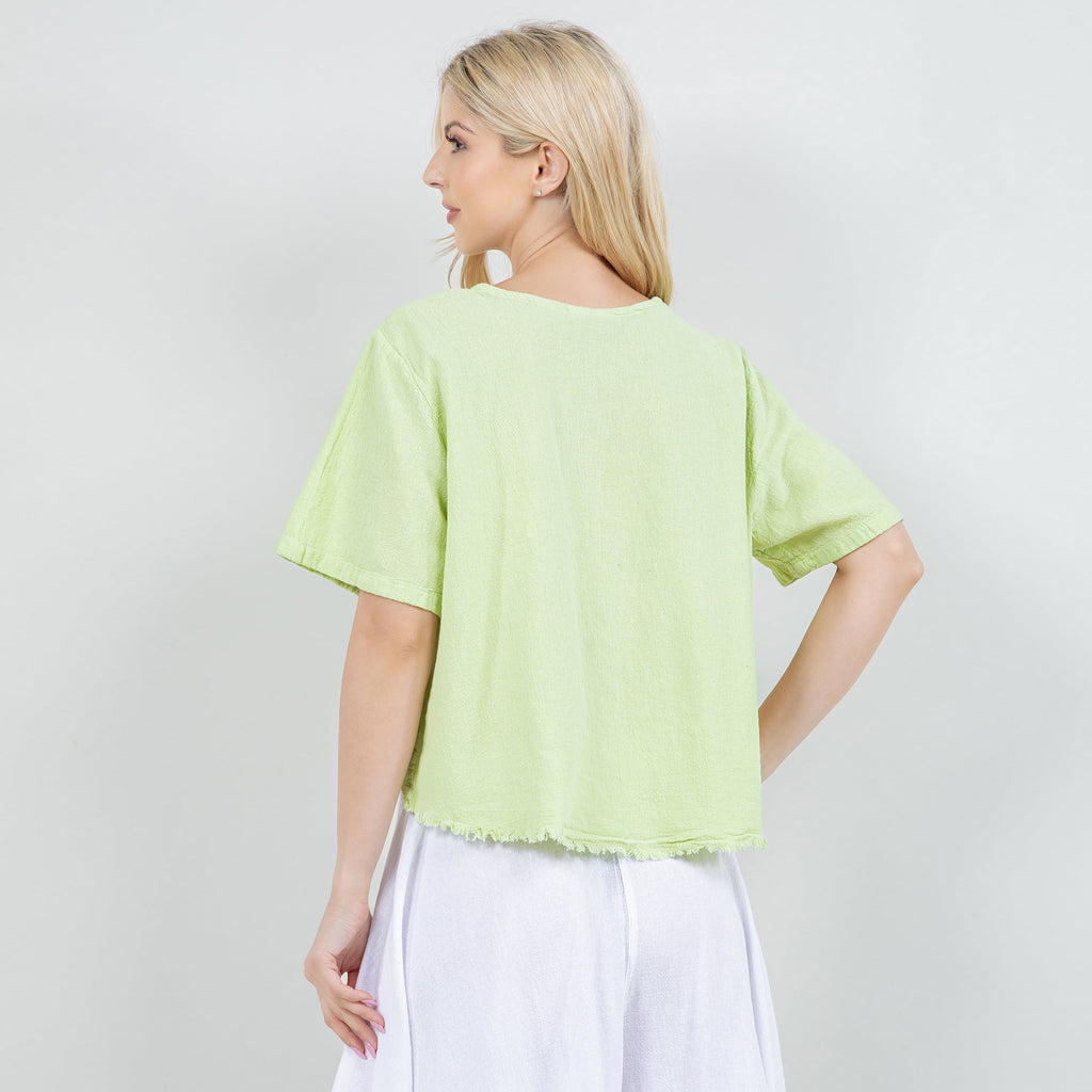 Lime green cotton gauze Heidi top, back view with short sleeves and raw hem