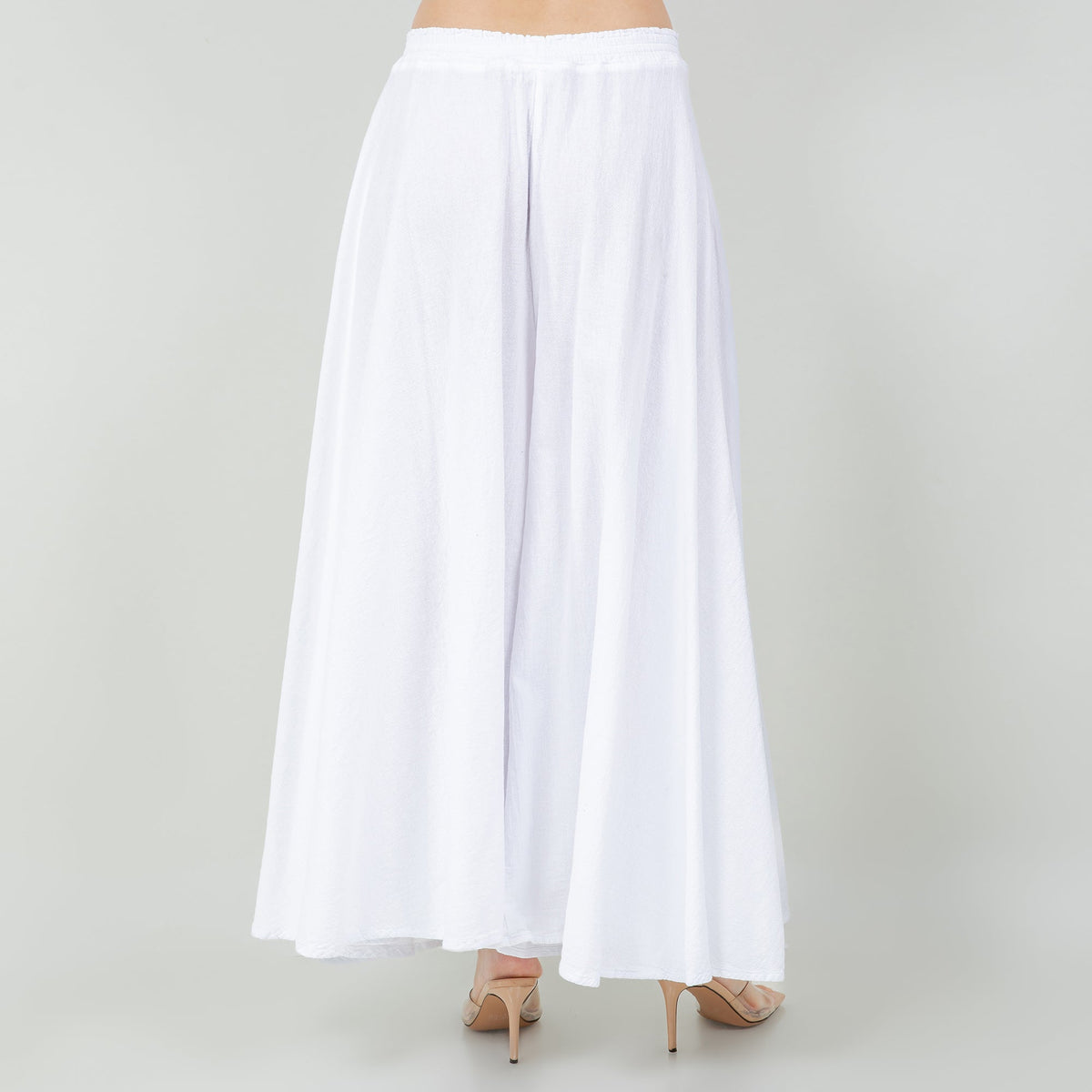 White cotton gauze Blanche pants back view with elastic waistband and wide-leg drape