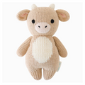 Hand-knitted baby cow plush toy, tan with white belly, black eyes and nose