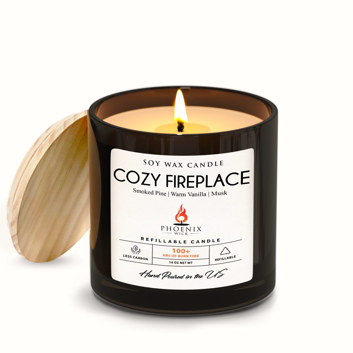 Fireplace-scented soy wax candle in black jar, wick lit