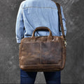 Vintage brown leather large briefcase with top handles and crossbody strap