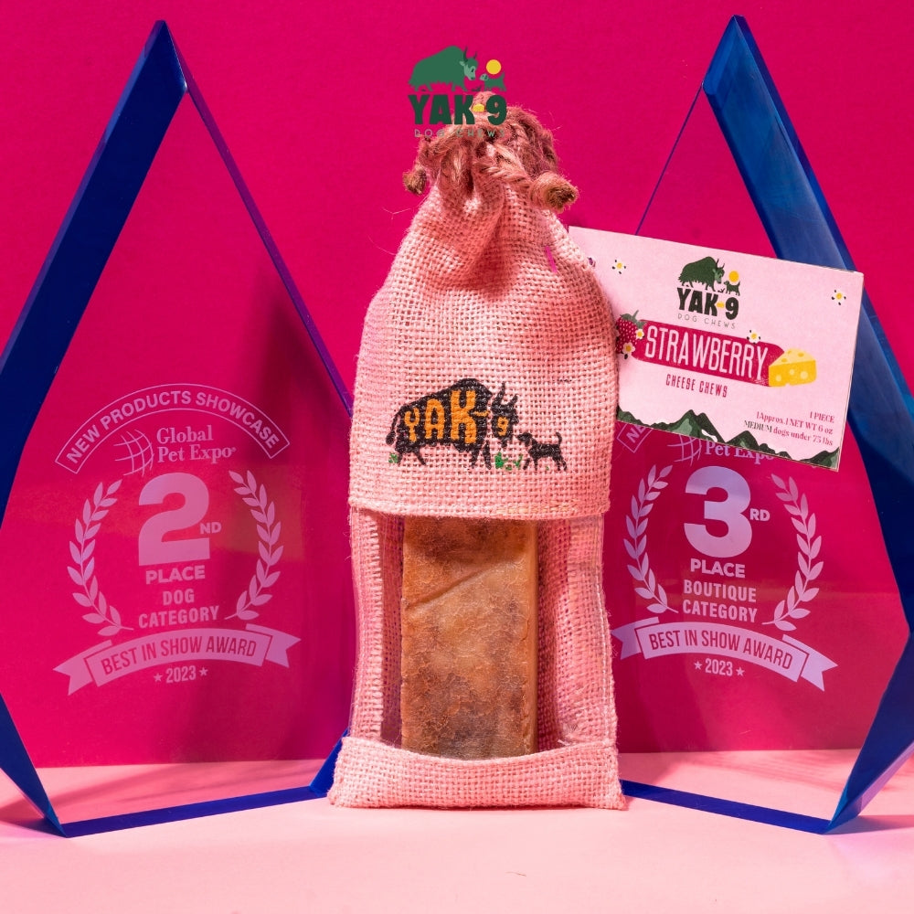 Strawberry cheese chew pouch with two award-style boxes in the background