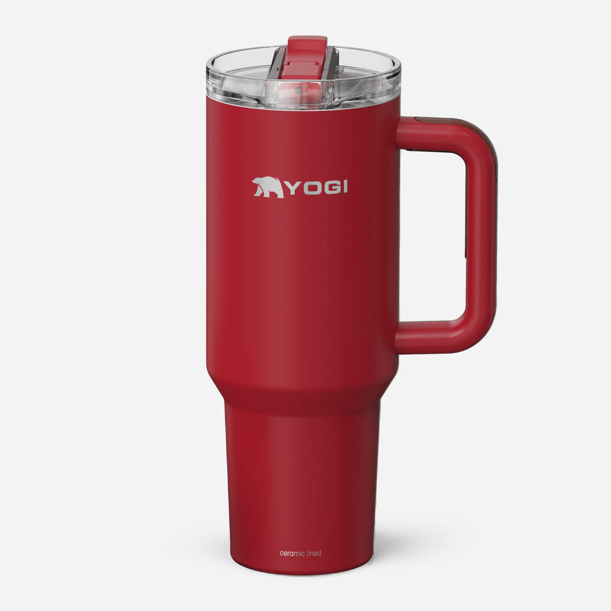 Red ceramic-lined Evolution tumbler with clear lid and red handle; YOGI logo on front.