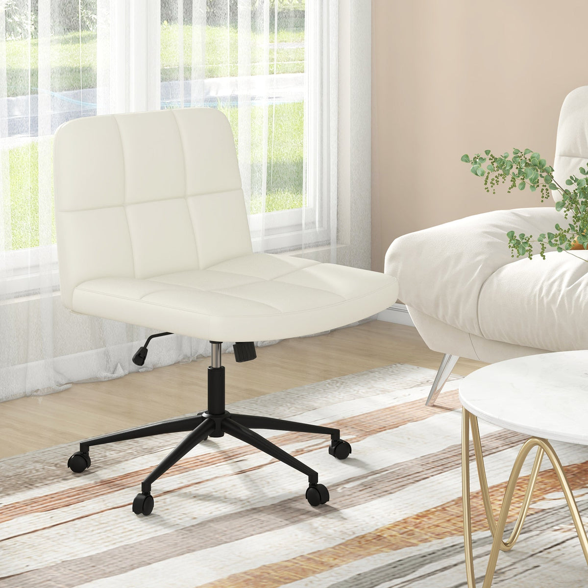 Beige armless office chair with cushioned seat, black pedestal and caster wheels