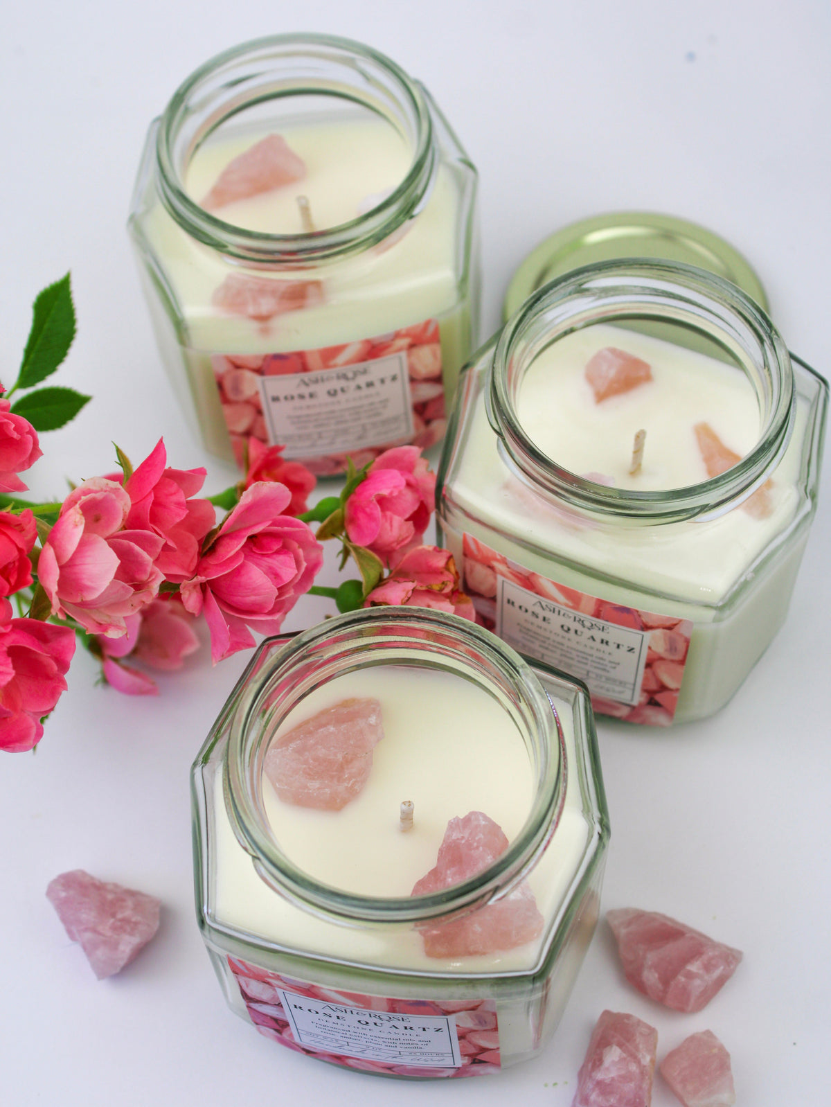 Crystal candle set in clear glass jars with rose quartz crystal wax pieces