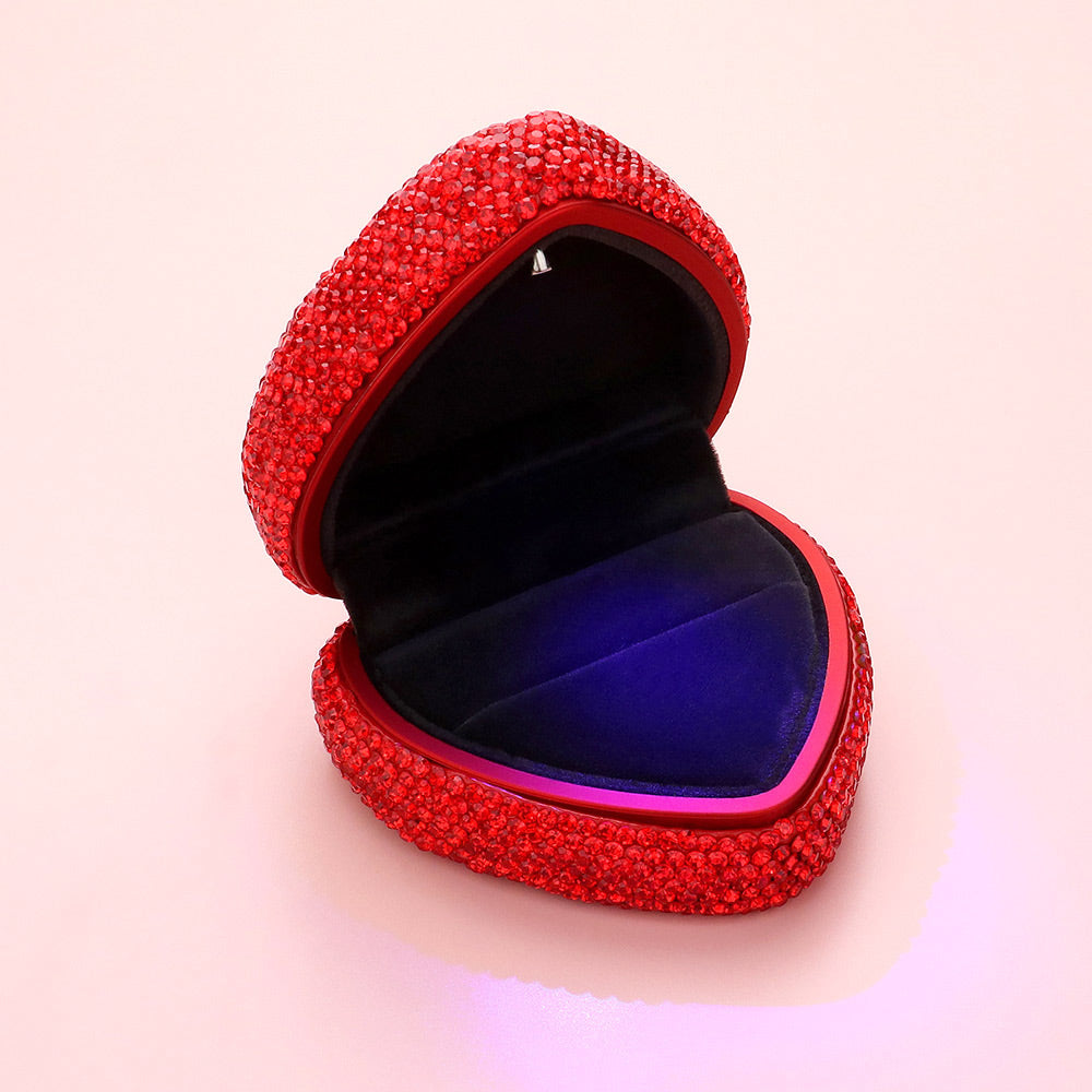 Heart-shaped ring case, red rhinestone exterior with open blue velvet top and base