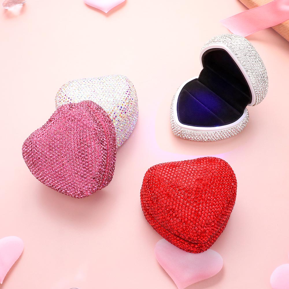 Heart-shaped ring cases in red and pink with rhinestone glitter, open and closed views