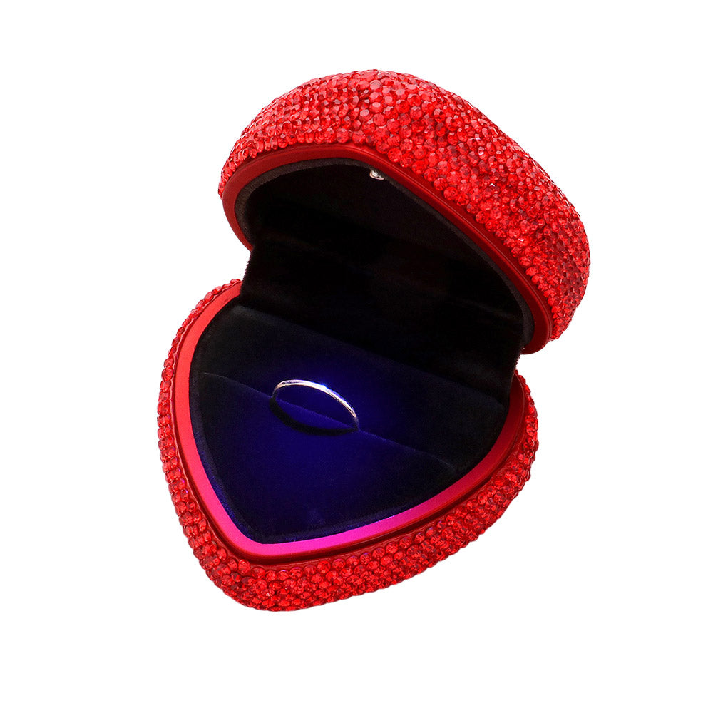 Heart-shaped ring case with red rhinestones, open showing blue velvet and ring display