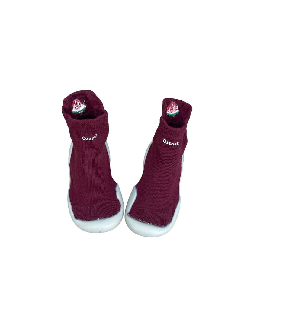 Maroon sock-style barefoot shoes with watermelon patch and white protective sole