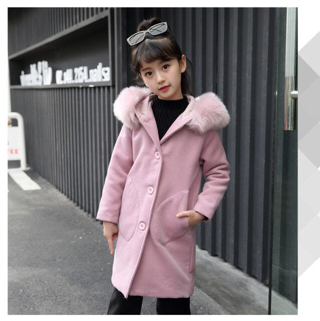 Girls pink hooded coat with faux fur trim at collar and sleeves, button closure