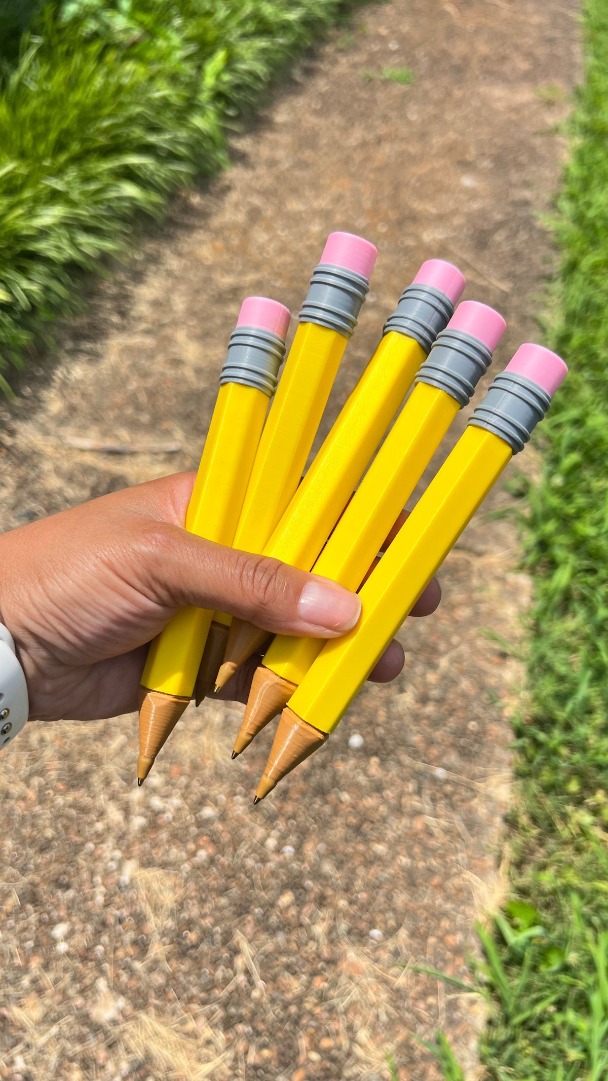 Jumbo novelty yellow pencil set with pink eraser and gray striped grip, wooden tip