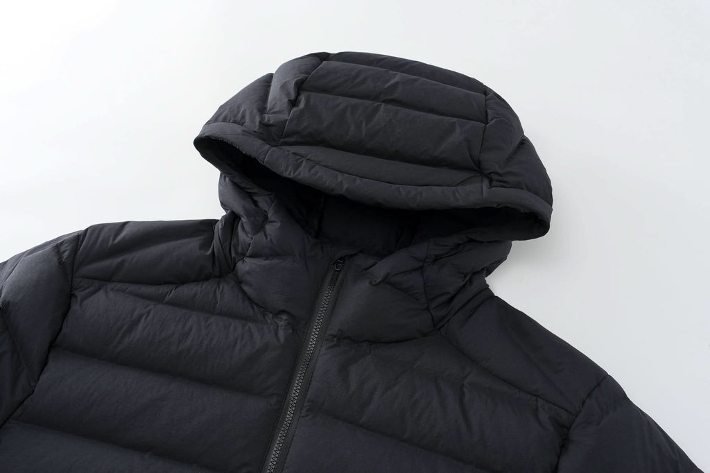 Black down jacket hood detail with full-zip and padded collar protection
