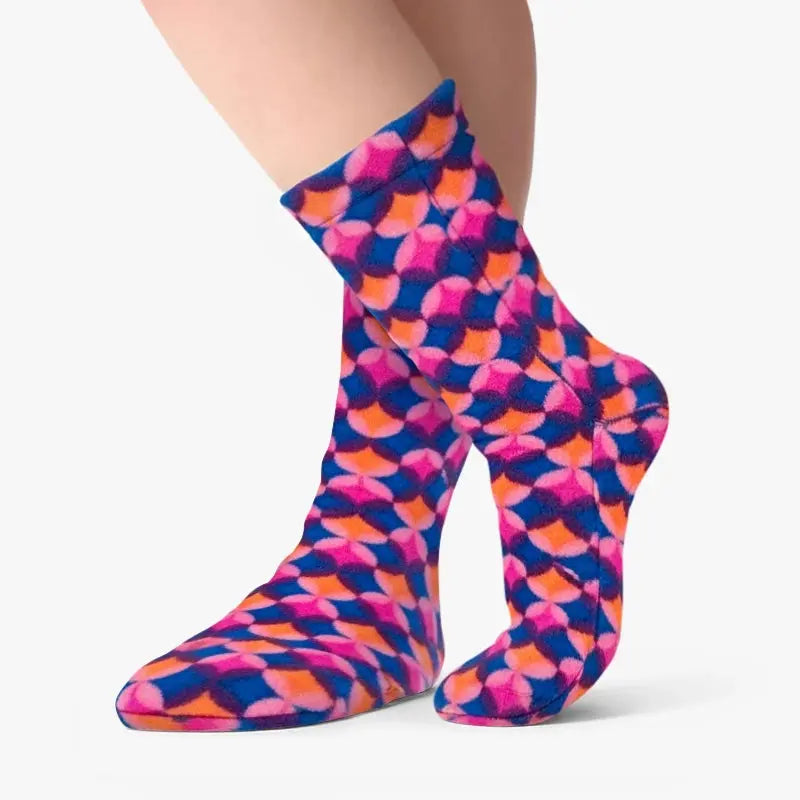 Kids fleece ankle socks with multicolor geometric pattern in blue, pink, and orange.