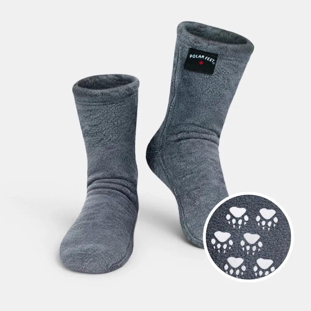 Soft grey fleece crew socks with white paw print non-slip soles