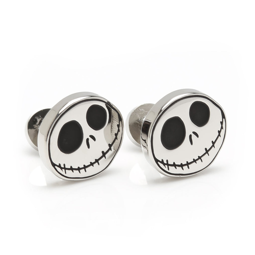 Pair of round silver cufflinks featuring Jack Skellington skull face emblems