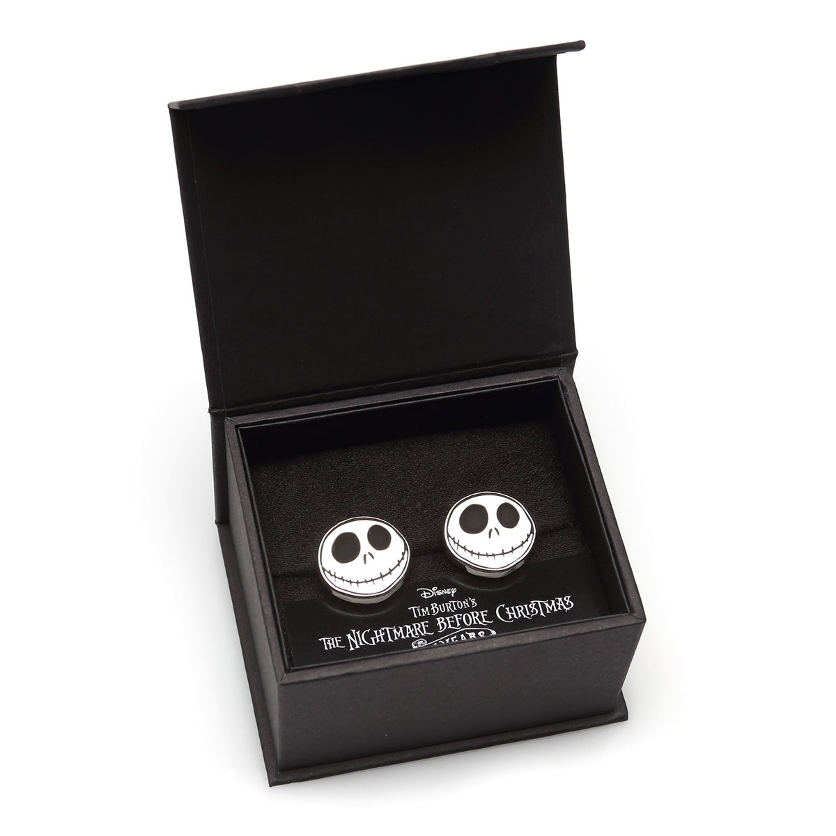 Cufflinks gift box showing two Jack Skellington skull face emblems