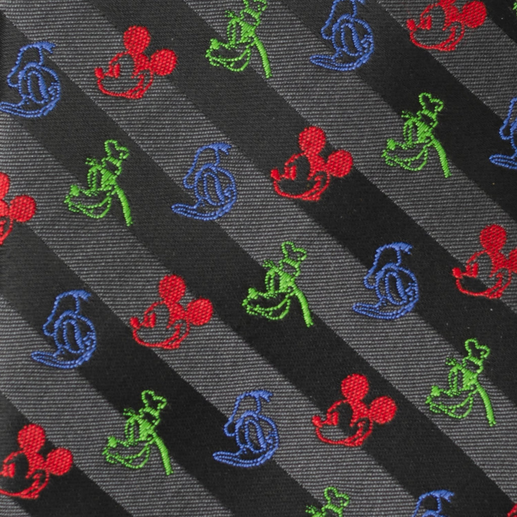 Close-up black tie with colorful character icons on diagonal gray stripes