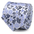 Blue and white floral necktie fabric with dark leaf and flower motifs