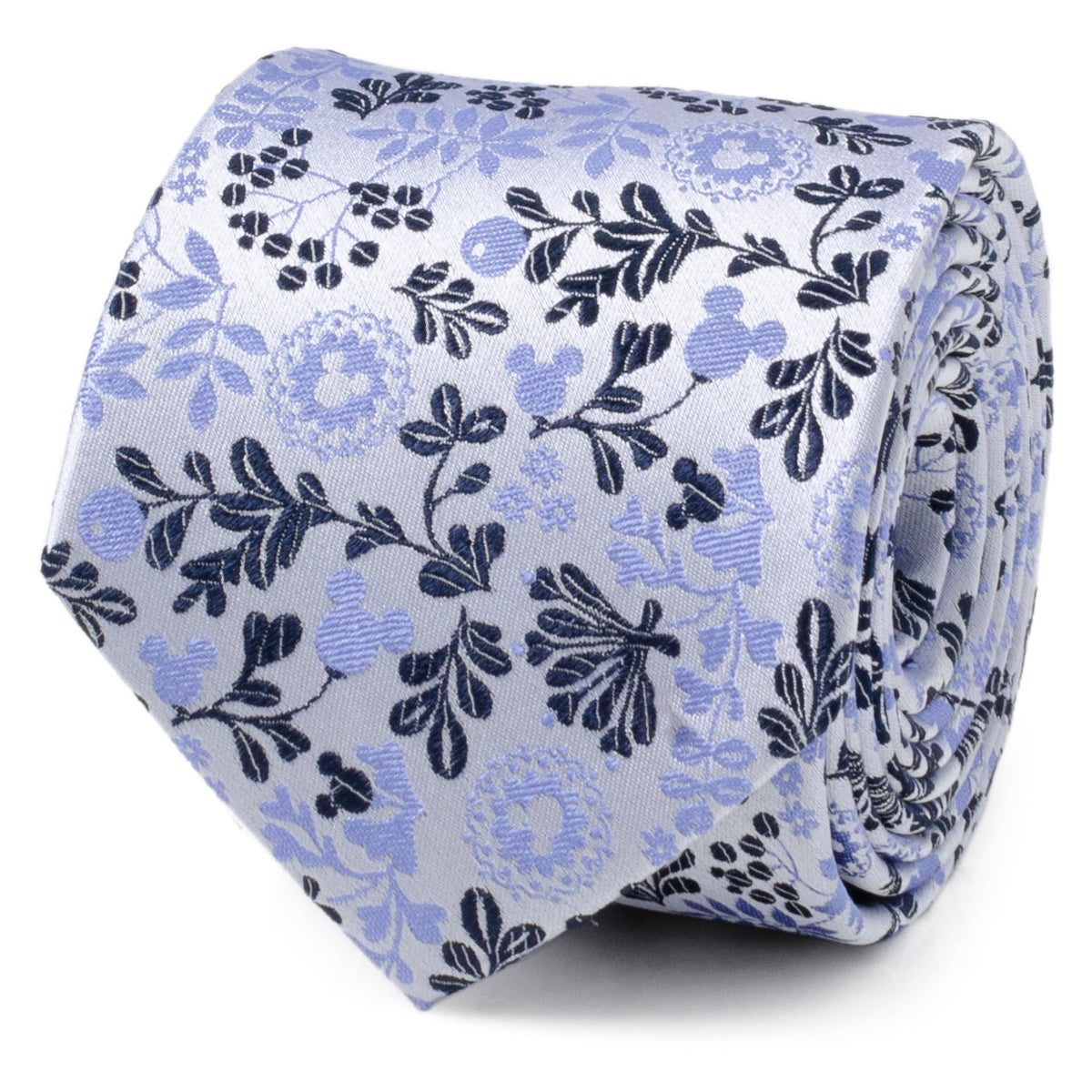 Blue and white floral necktie fabric with dark leaf and flower motifs