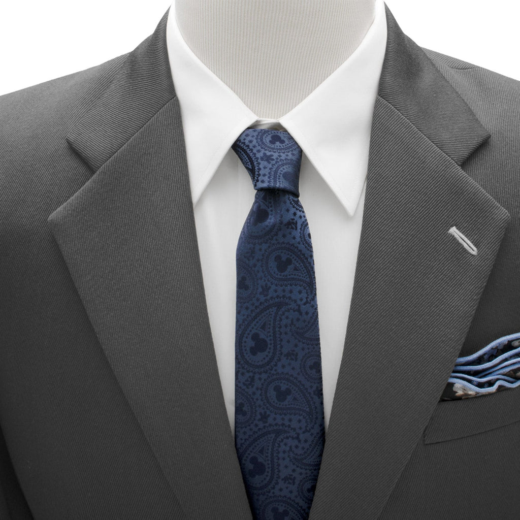 Navy patterned Mickey Mouse paisley tie worn with white shirt