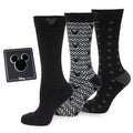 Three pairs of black Mickey-pattern socks: striped, checker, and dot designs
