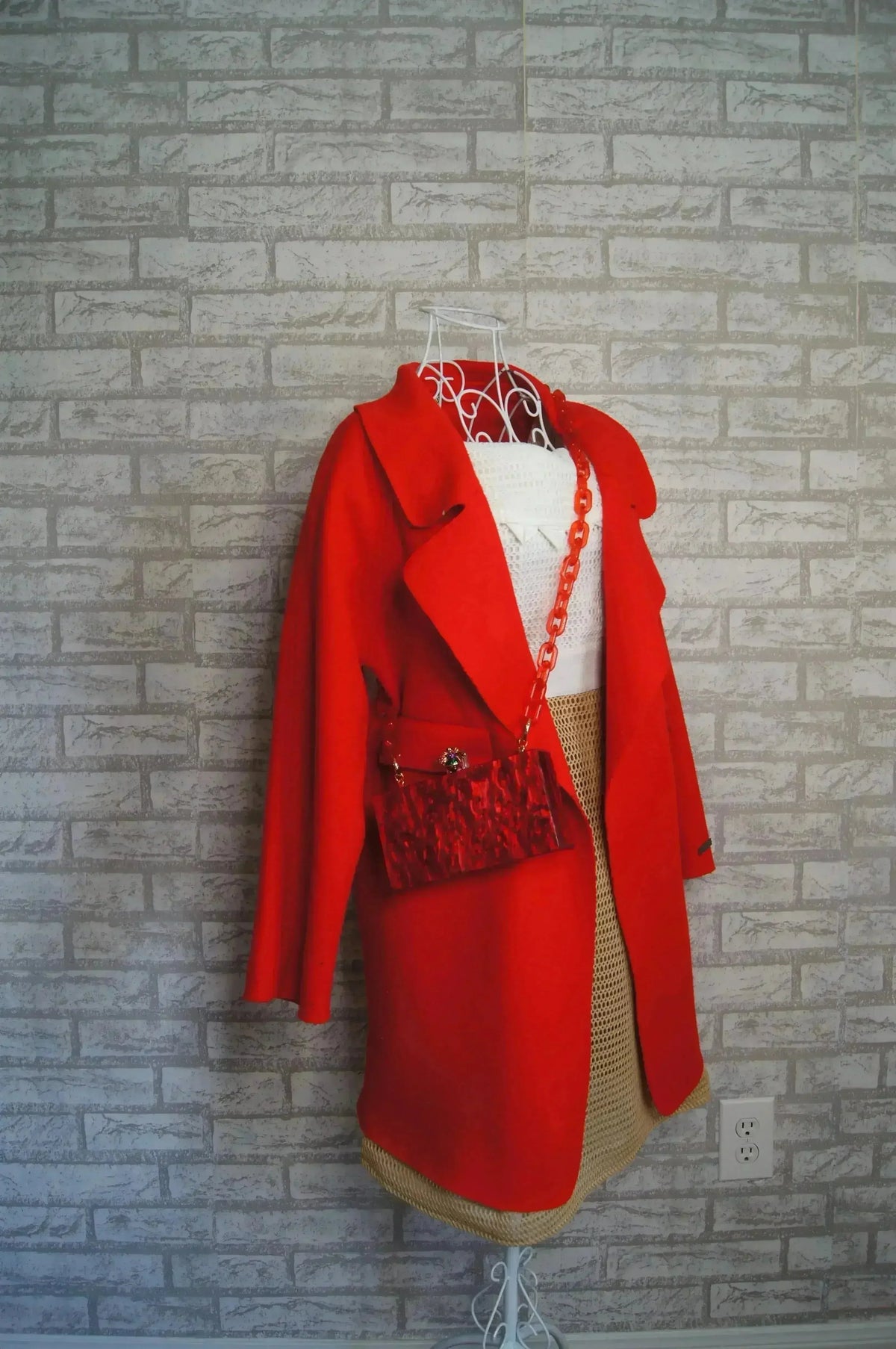 Red long-sleeve dress/jacket with chain trim and layered front