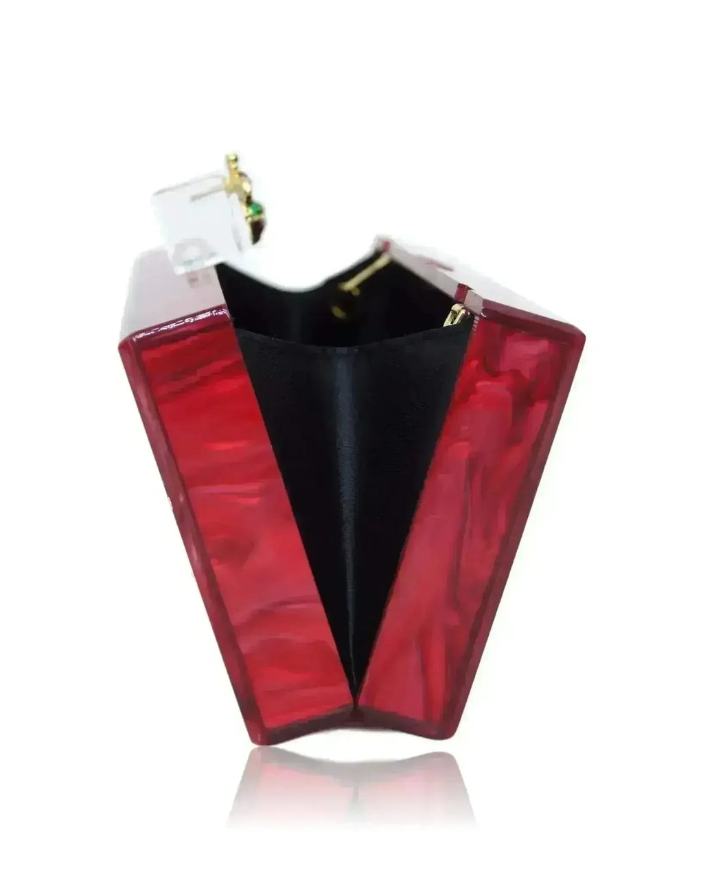 Red acrylic box clutch open, showing black interior and gold clasp