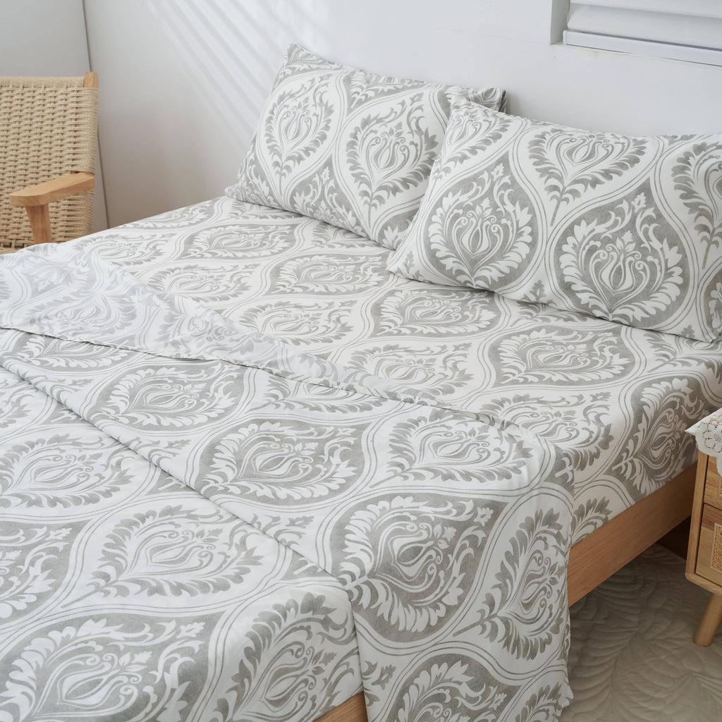 Gray and white damask bed sheet set with matching pillow shams