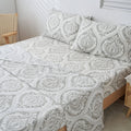 Gray and white damask bed sheet set with matching pillow shams