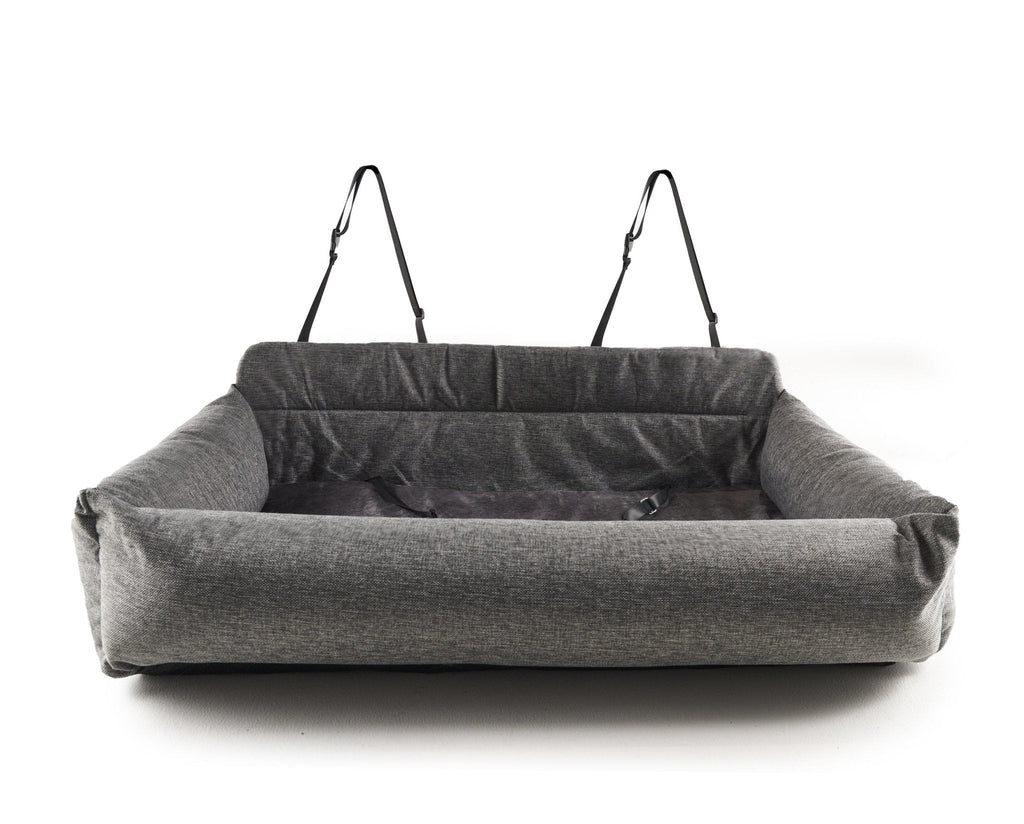 Gray dog car bed with open top, plush padding, and two hanging handles.